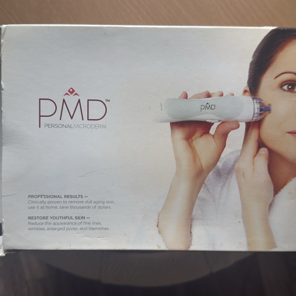 New In Box Never Used PMD Skincare Device in Light Green and White